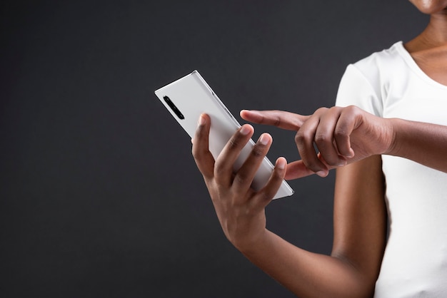 African American woman using her smartphone