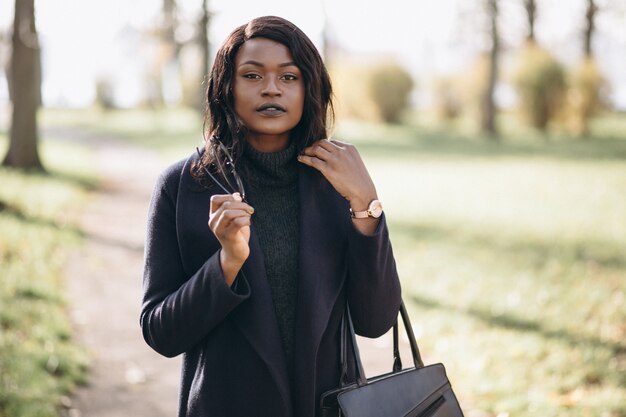 African american woman walking in the park