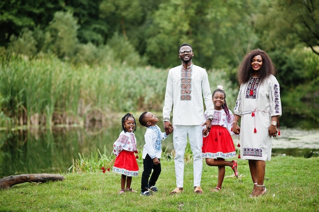 African family in traditional clothes at park