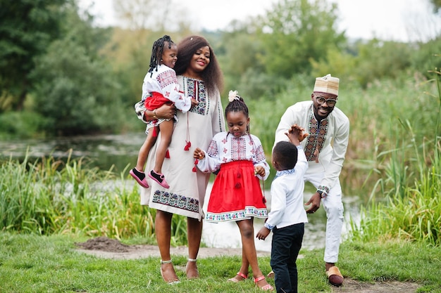 African family in traditional clothes at park