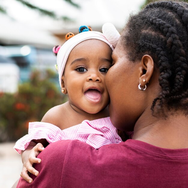 African mother and little girl close up