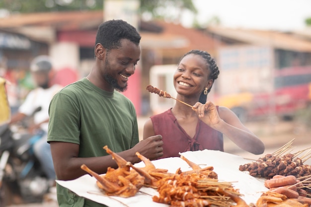 African people getting some street food