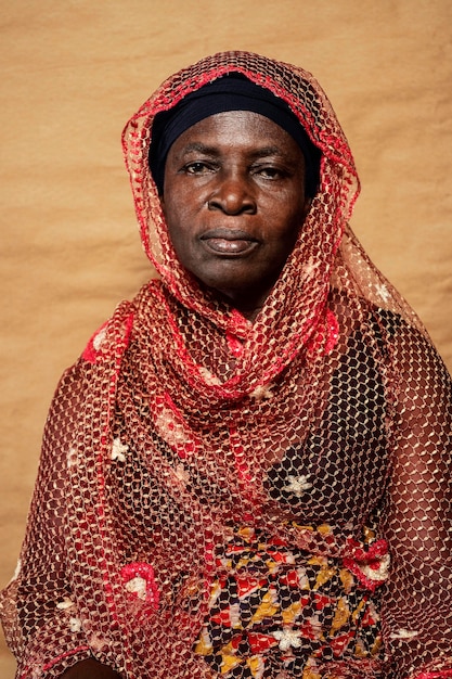 Free Photo african senior woman with traditional clothes