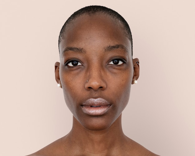 African woman face photography, skinhead hairstyle