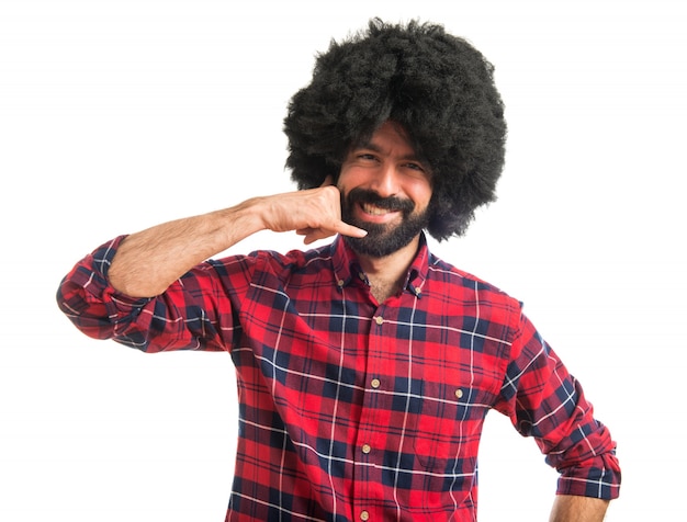 Afro man making phone gesture