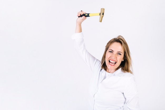 Free Photo aggressive woman with hammer