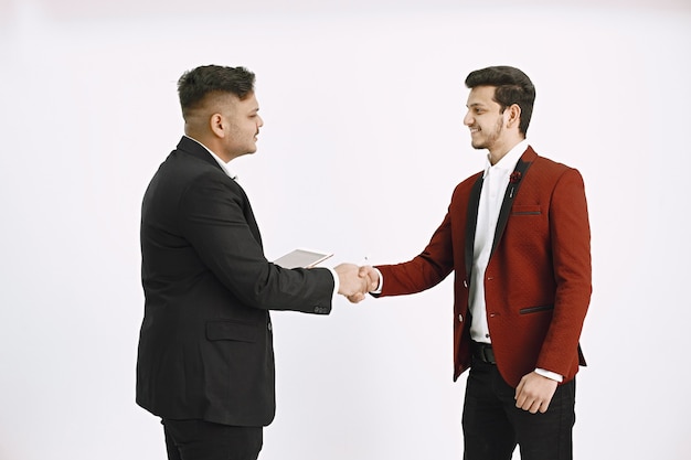 Free Photo agreement between coworkers. two men having a deal.