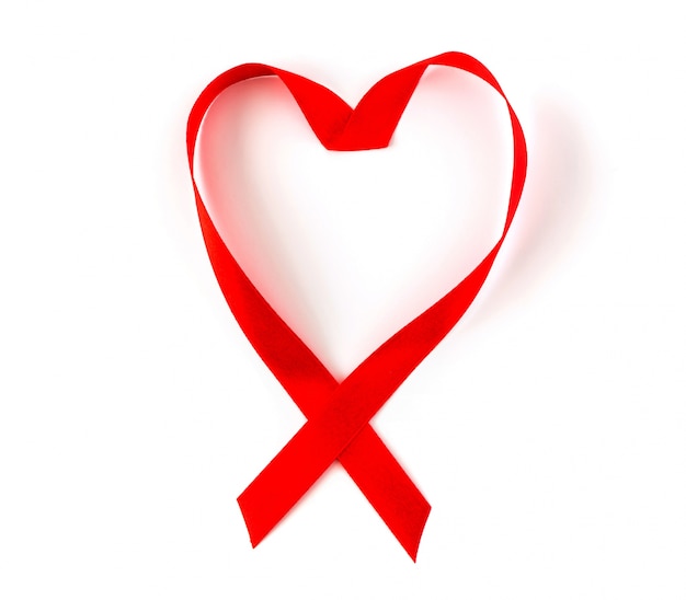 Free photo aids awareness red heart ribbon isolated on white background