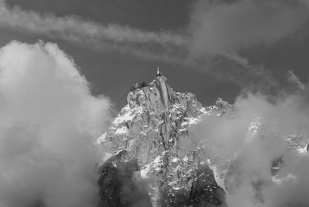 Free photo aiguille du midi, mont blanc massif with clouds