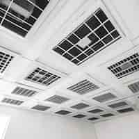 Free photo air conditioner and air conditioning in the ceiling of an office building