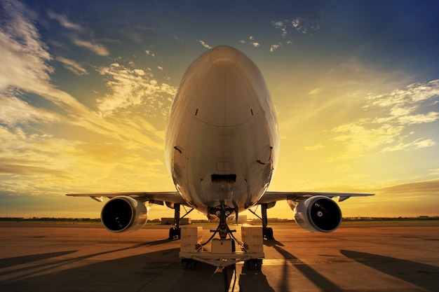 Free photo airplane at sunset