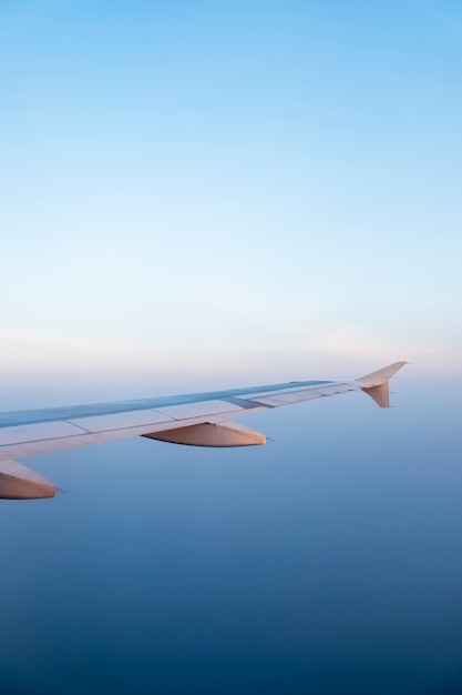 airplane wing and blue sky