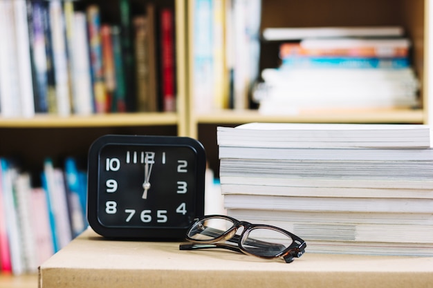 Free photo alarm clock and glasses