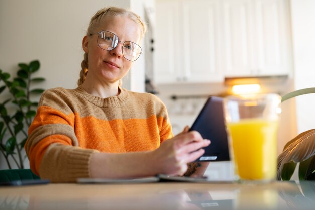 Albino person at home doing activities