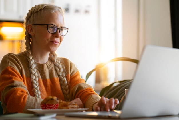 Albino person at home doing activities