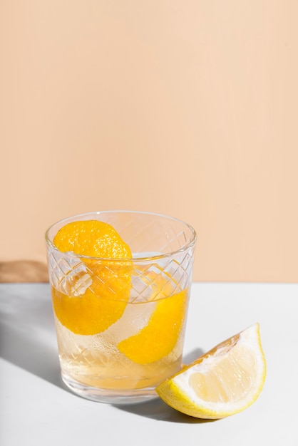 Alcoholic beverage cocktail and lemon copy space