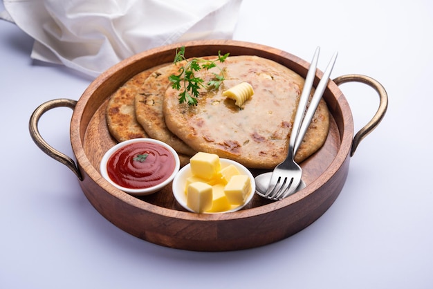 Aloo paratha or gobi paratha also known as Potato or Cauliflower stuffed flatbread dish originating from the Indian subcontinent