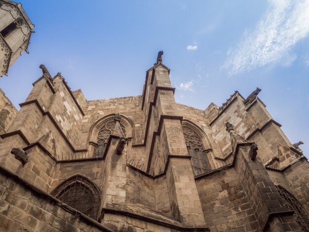 Amazing low angle view of the Chapel of St. Agatha and Roman wall in Barcelona