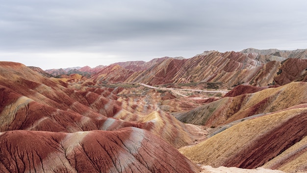 Amazing scenery of colored mountains under a cloudy sky