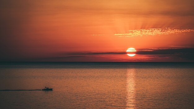 Amazing shot of a beautiful seascape on an orange sunset