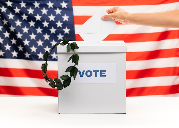 American citizen putting the vote in the ballot box