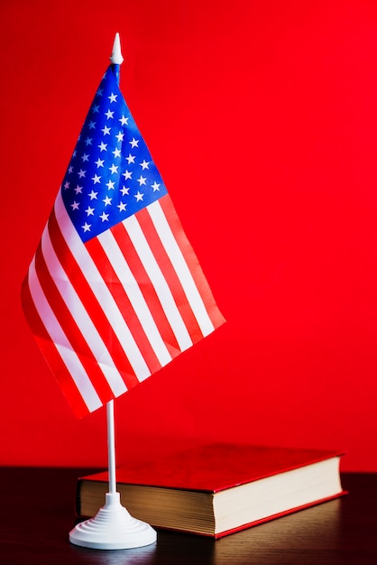 American flag background with book