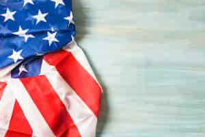 Free photo american flag on wooden textured backdrop