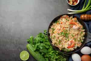 Free photo american shrimp fried rice served with chili fish sauce thai food.