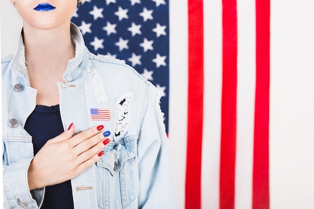 Free photo american woman posing in front of flag