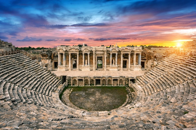 Amphitheater in ancient city of Hierapolis at sunset, Pamukkale in Turkey.