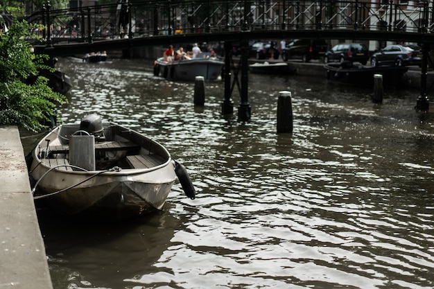 Free photo amsterdam canals, boats walk on water