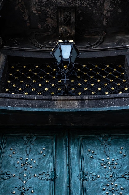 Ancient doors in the cathedral turquoise old doors