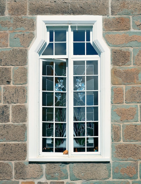 Ancient window of old building in Quebec City