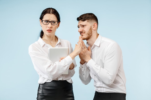 Angry boss. Woman and his secretary standing at office or studio. Businessman screaming to his colleague. Female and male caucasian models. Office relationships concept, Human emotions