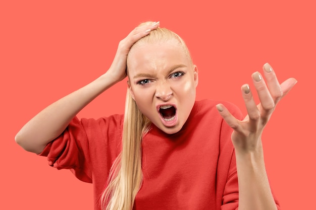 Angry woman looking at camera.