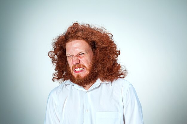 The angry young man with long red hair