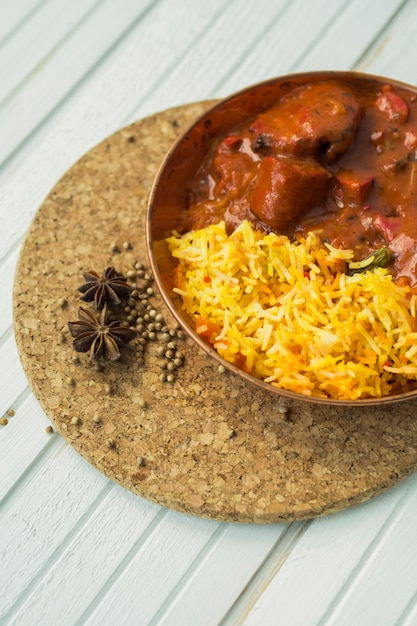 Free photo anise and pepper near rice dish