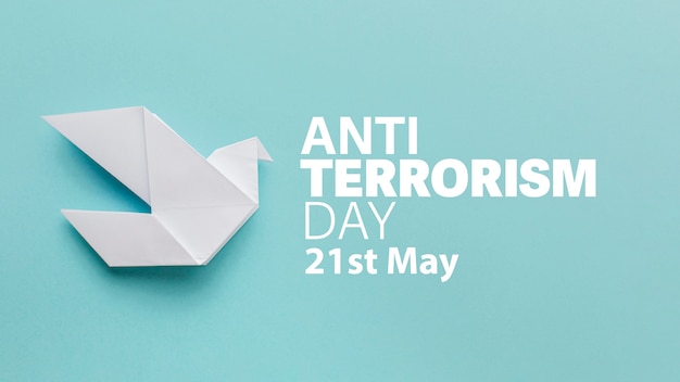 Free photo anti terrorism day with paper dove