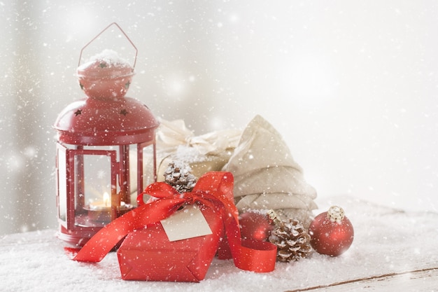 Free photo antique lamp with red gift