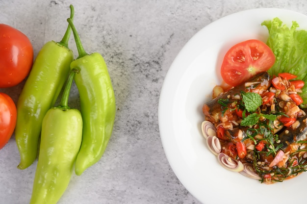 Free Photo appetizers with sardine in tomato sauce and spicy