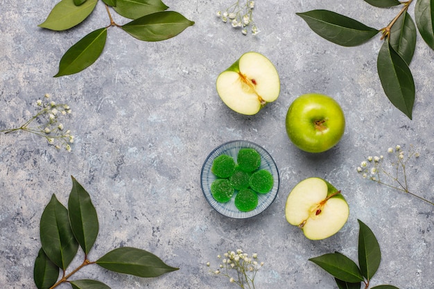 Apple green marmalade candy in sugar. Healthy dessert for gourmets.