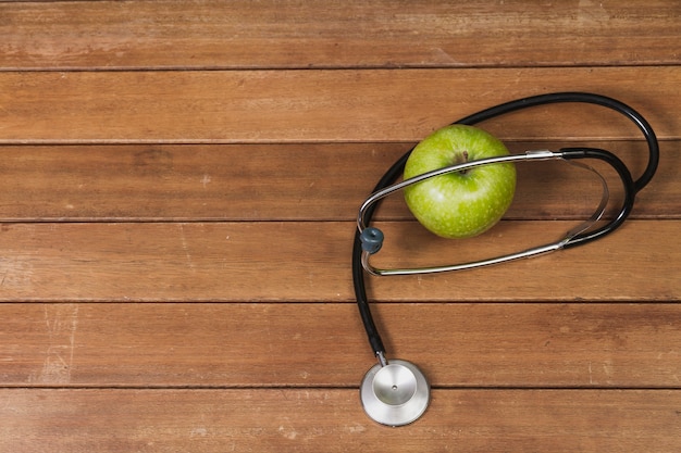 Free Photo apple and stethoscope