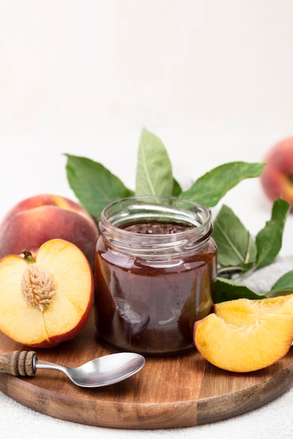 Free Photo apricots jam on wooden board