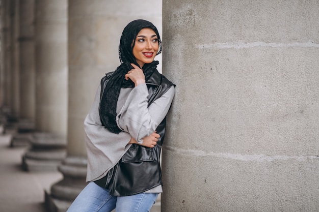 Free photo arabian woman in hijab ouside in the street