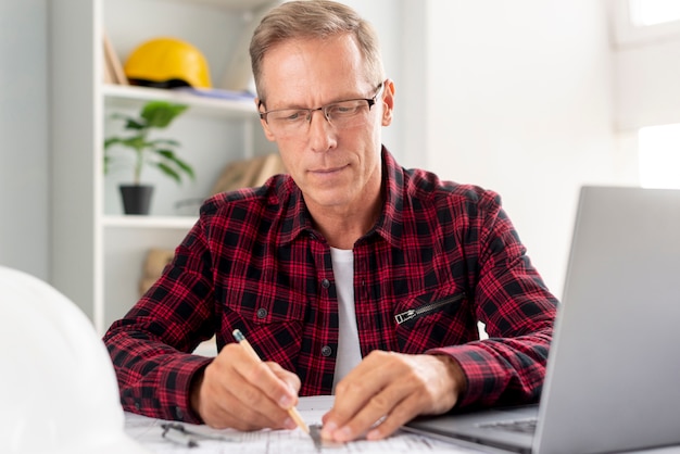 Free Photo architect doing a project at his desk