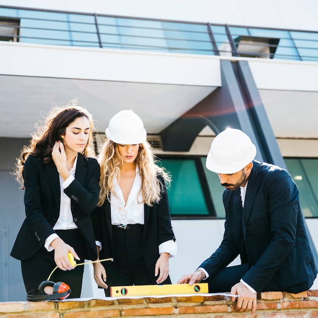 Architects wearing helmets