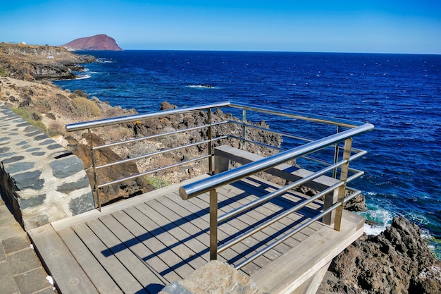 Free photo area protected by metal frames in front of the ocean