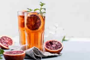 Free photo aromatic fruit ice tea on table