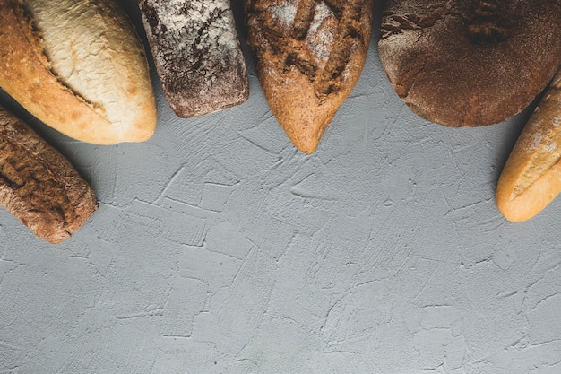 Free photo arranged bread assortment on table