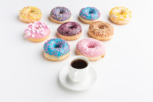 Free Photo arranged donuts with coffee